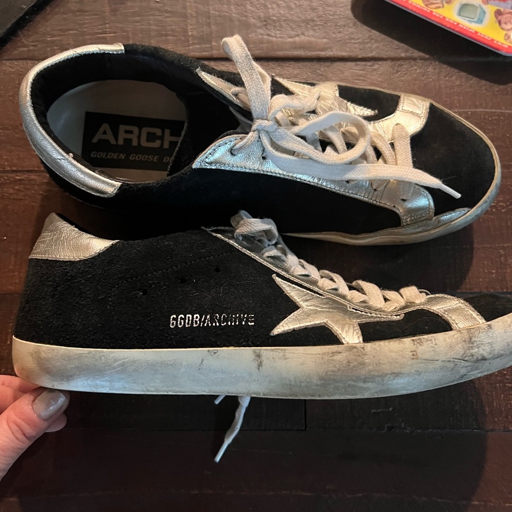 Original golden goose black/silver archive.